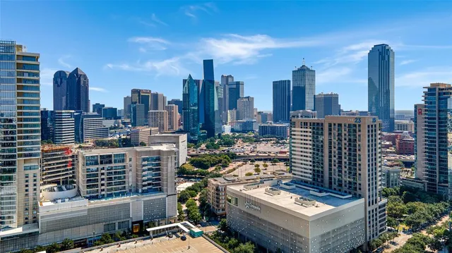 a view of a city with tall buildings