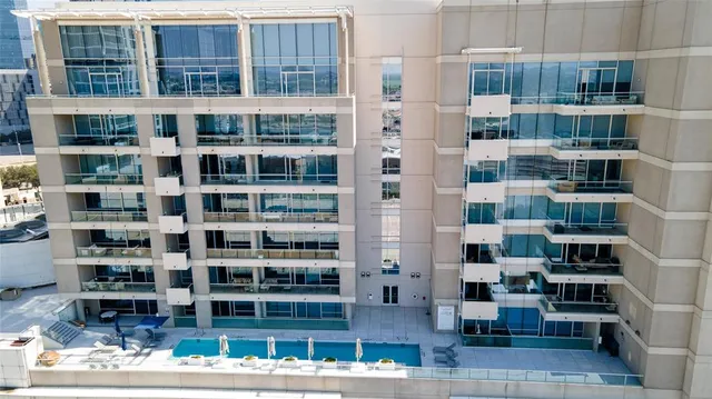 a front view of a building with glass windows