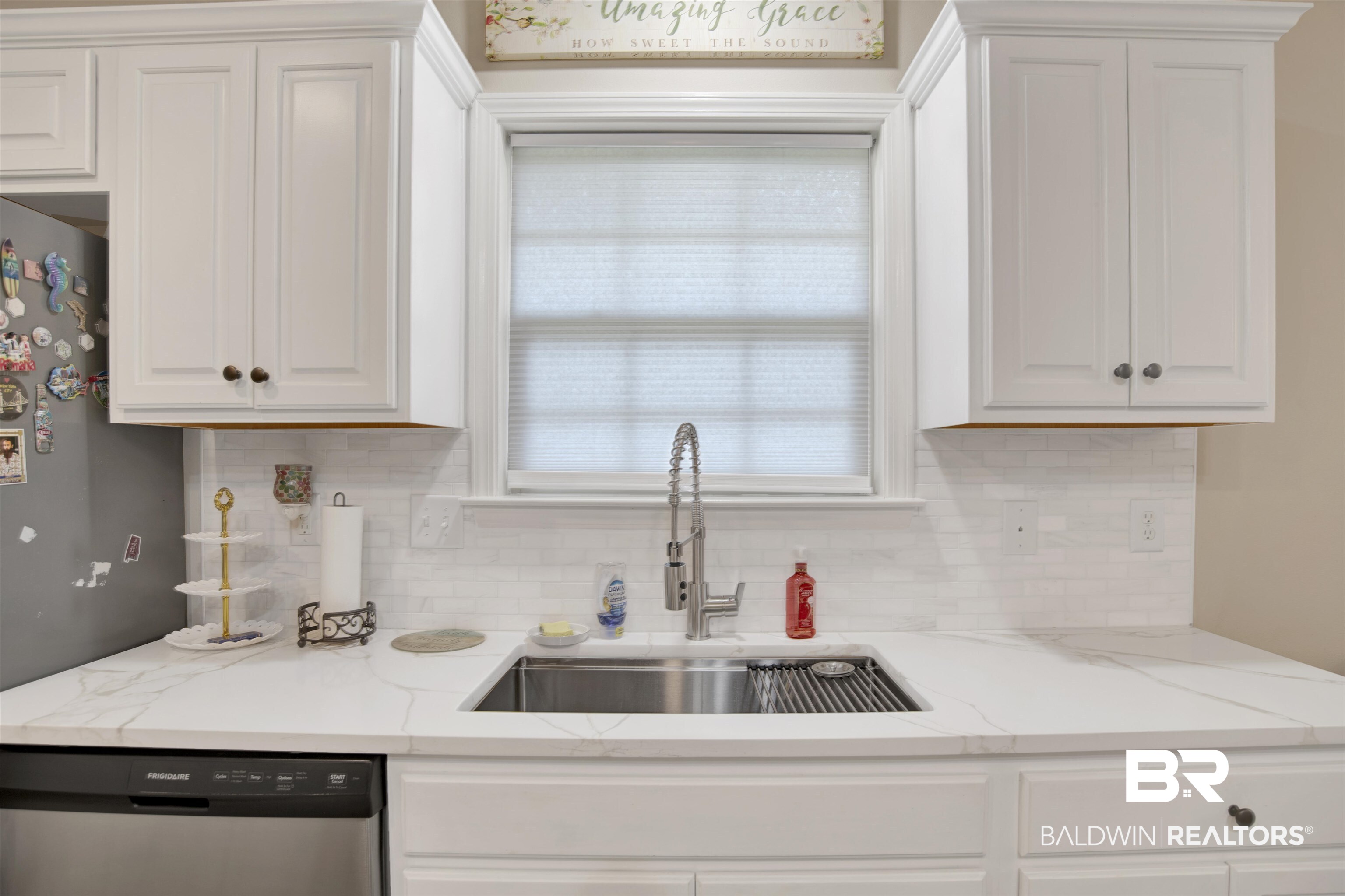 8542 Three Dean Way Mobile, AL 36695 - Photo 12 of 26 Kitchen with dishwasher, a sink, and white cabinets
