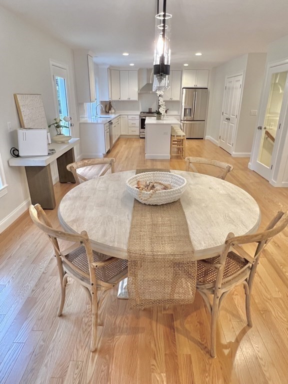 9 Shaker Pond Road Ayer, MA 01432 - Photo 8 of 16 a view of a dining room with furniture