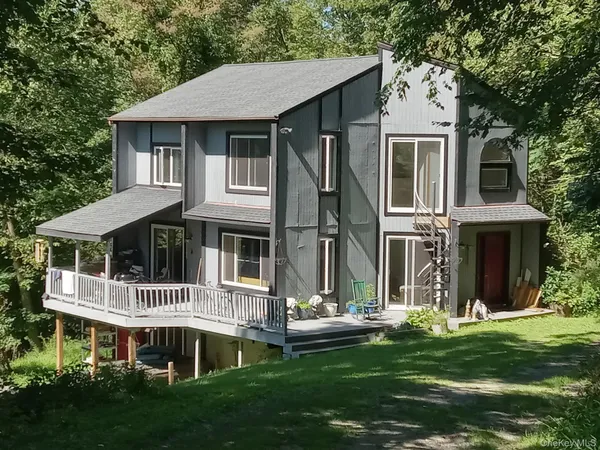a view of a lake in a forest