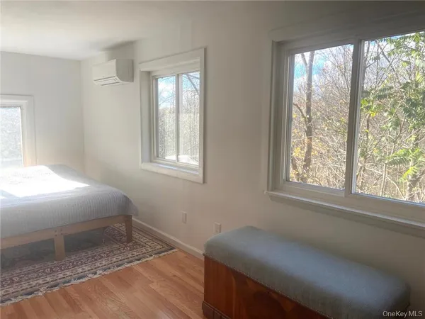 a bathroom with a bathtub and toilet