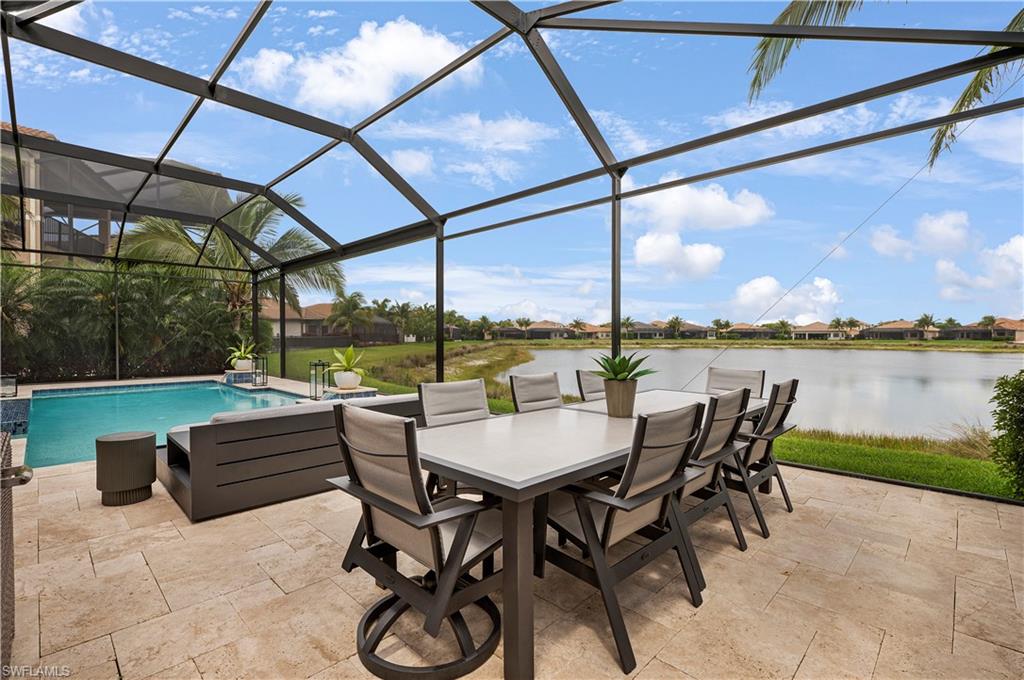 4353 Caldera Circle Naples, FL 34119 - Photo 30 of 40 a view of outdoor space with seating area and swimming pool