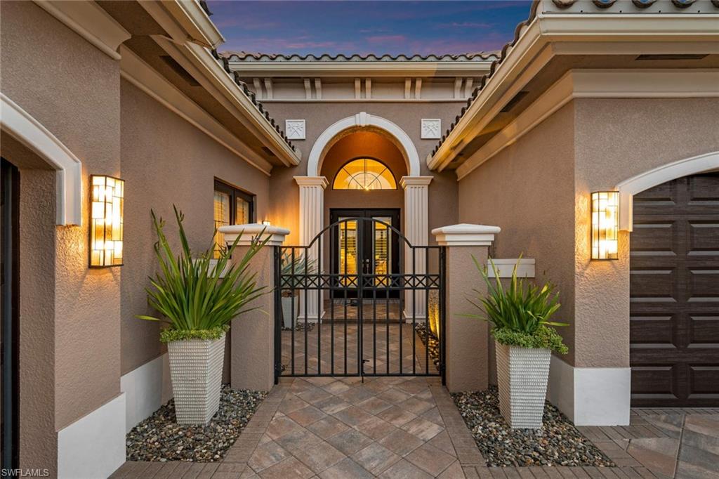 4353 Caldera Circle Naples, FL 34119 - Photo 39 of 40 a view of entryway with a flower pot