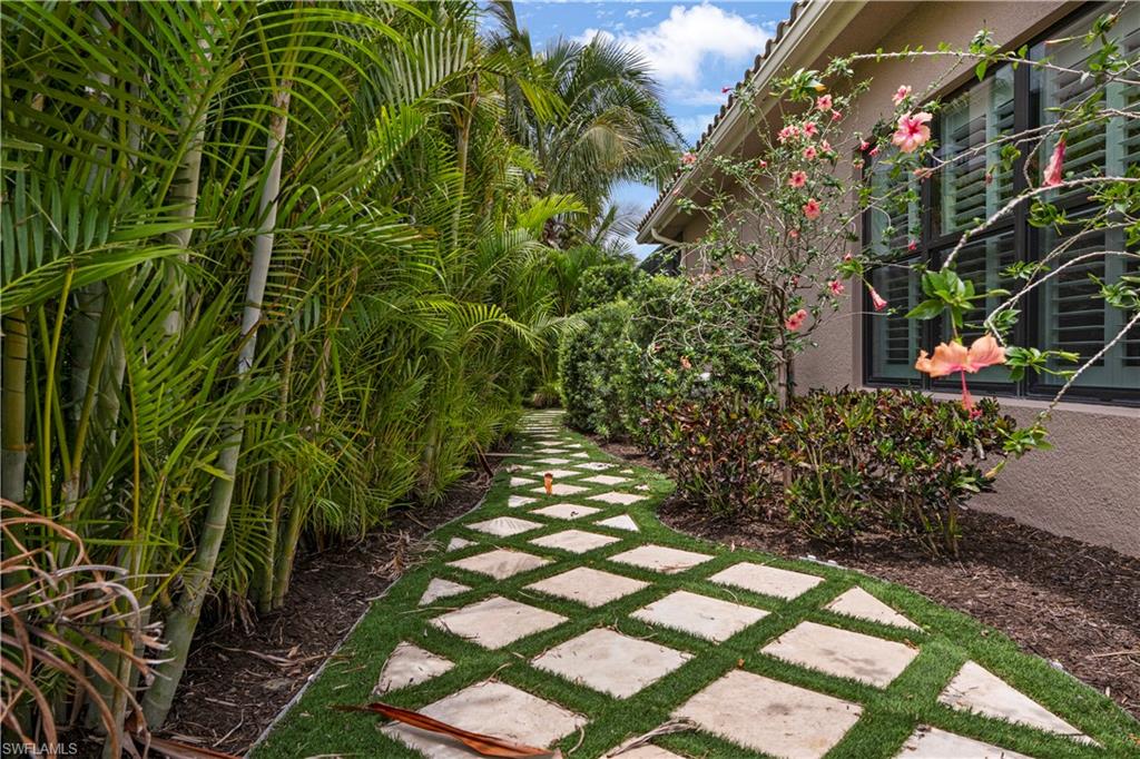 4353 Caldera Circle Naples, FL 34119 - Photo 40 of 40 a view of a garden
