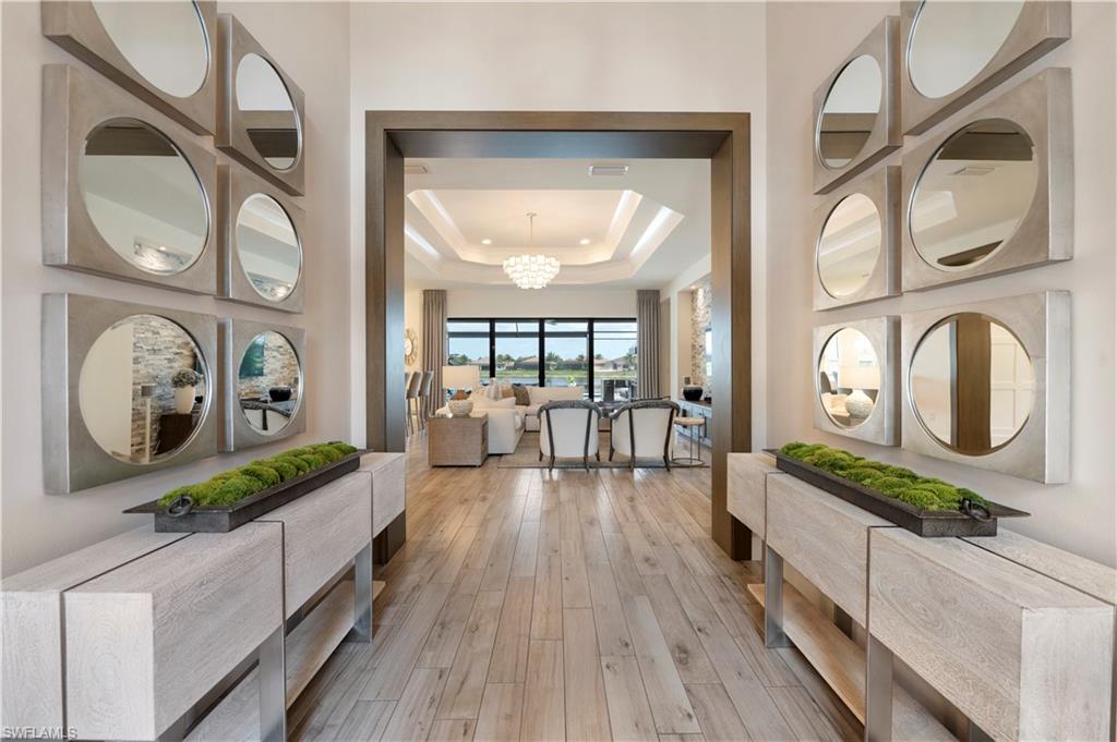 4353 Caldera Circle Naples, FL 34119 - Photo 4 of 40 a view of living room and wooden floor