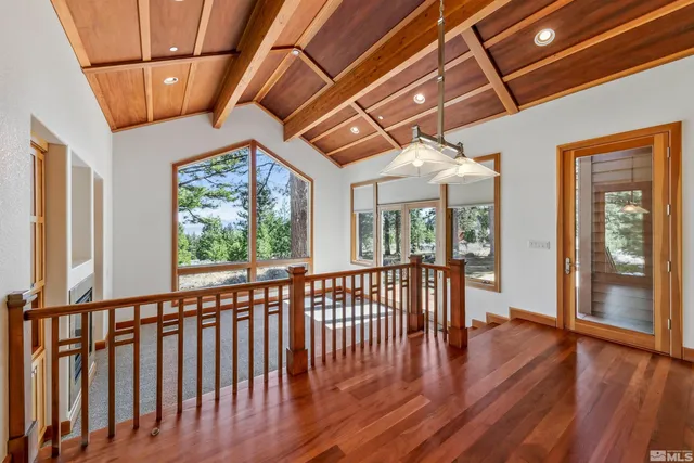 a view of a porch with wooden floor