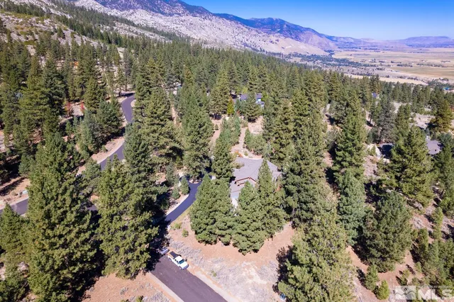 a view of a city with mountains in the background