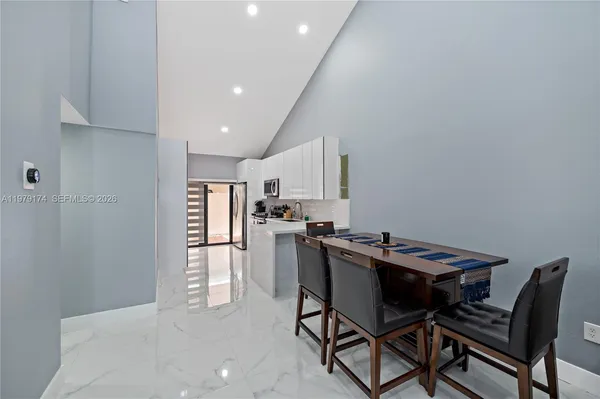 a view of a dining room with furniture