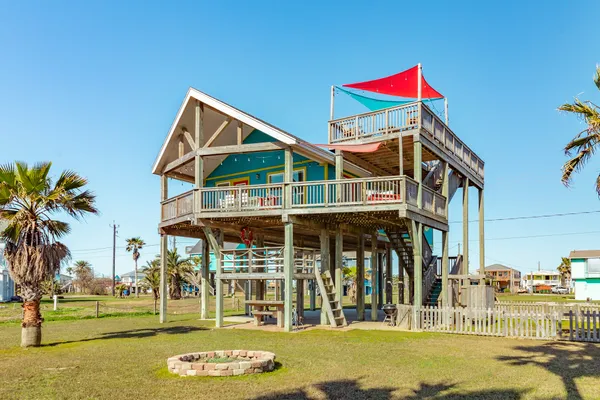 a view of a balcony with furniture