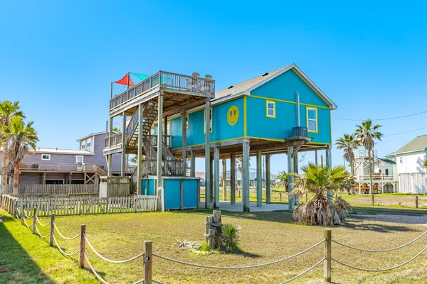 a view of balcony with furniture