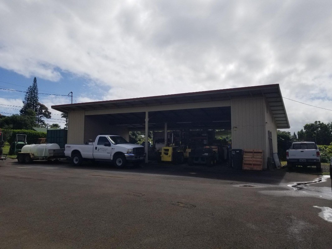 2 Kaiwiki Road Hilo, HI 96720 - Photo 3 of 8 a view of a car parked in front of a house