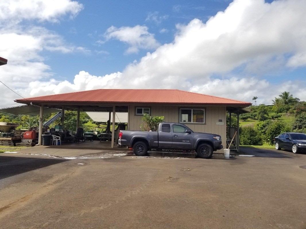 2 Kaiwiki Road Hilo, HI 96720 - Photo 4 of 8 a view of building with car parked