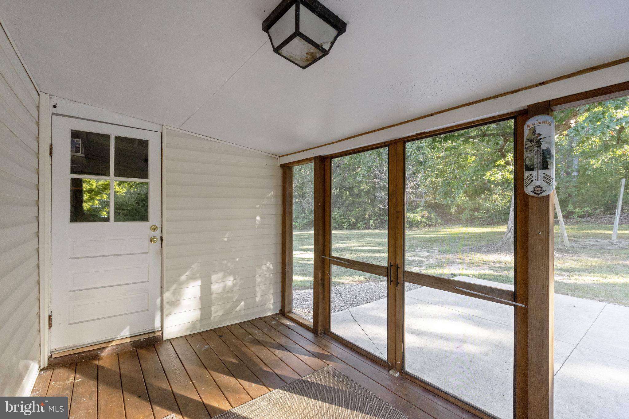 20455 Monrovia Road Orange, VA 22960 - Photo 17 of 41 a view of empty room with wooden floor and fan