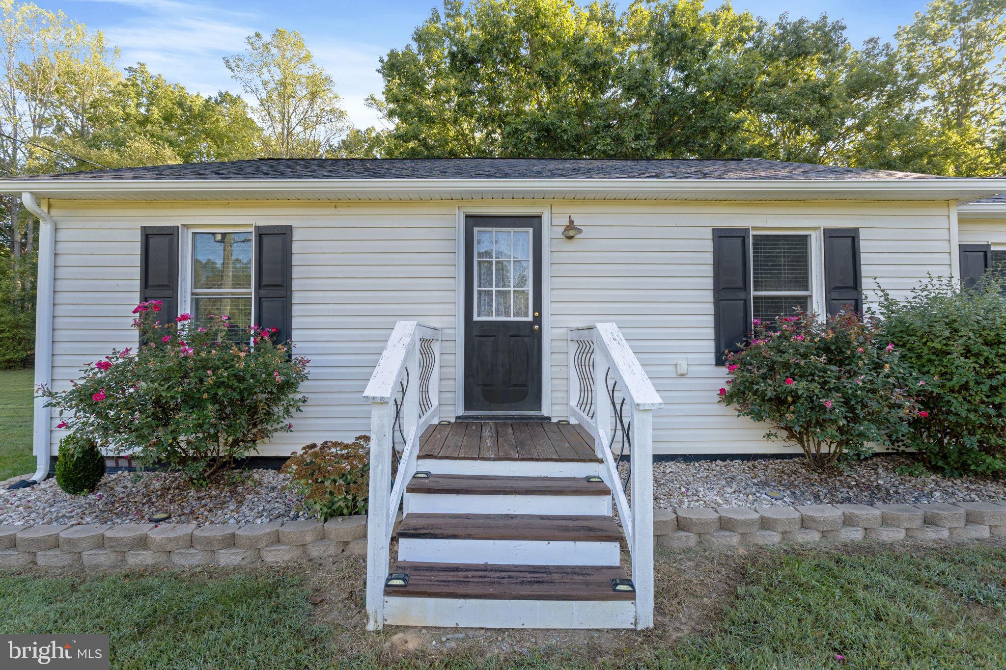 20455 Monrovia Road Orange, VA 22960 - Photo 28 of 41 a view of a house with backyard and plants
