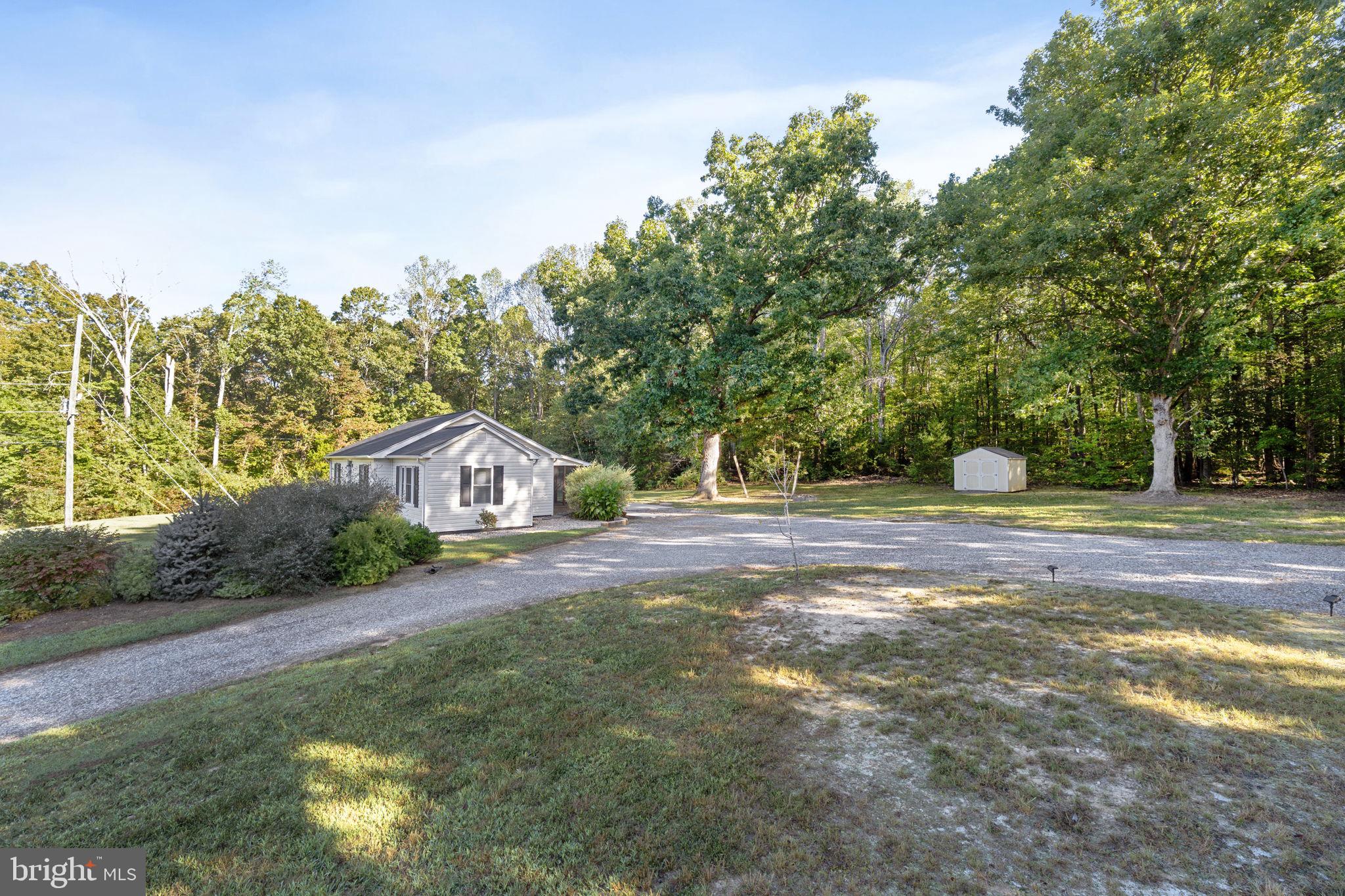 20455 Monrovia Road Orange, VA 22960 - Photo 40 of 41 a front view of a house with a yard and garage