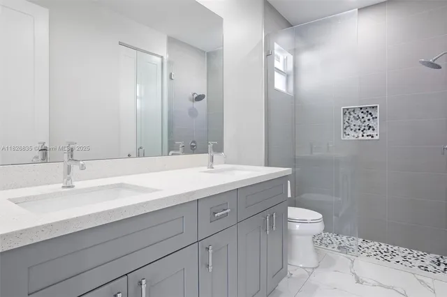 an empty room with a ceiling fan