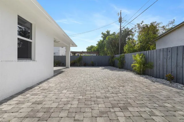 a street view with wooden fencing