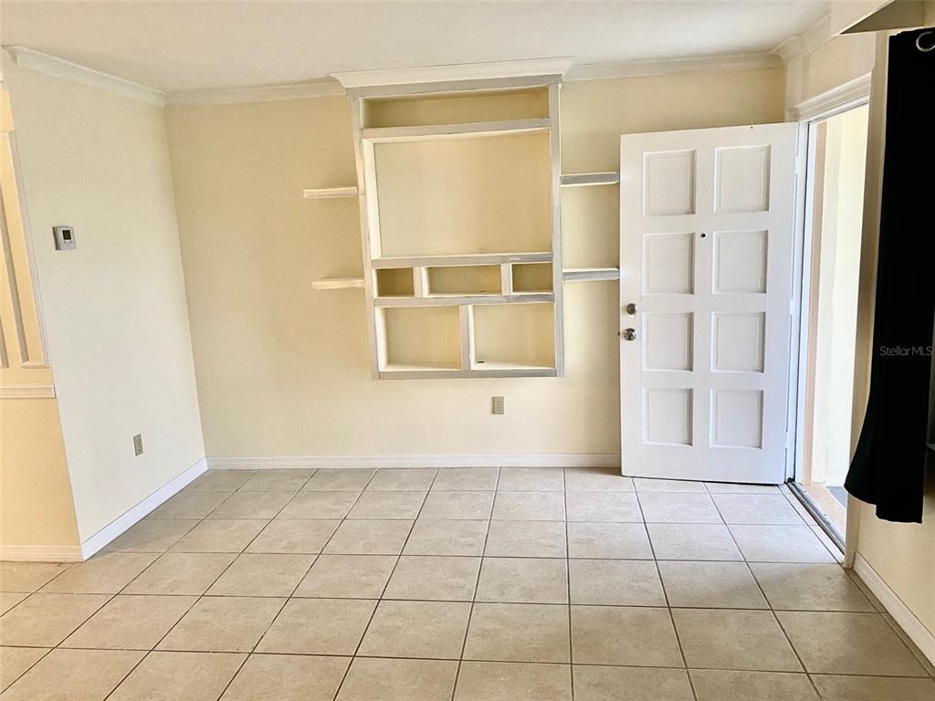 3906 Headsail Drive New Port Richey, FL 34652 - Photo 8 of 21 a view of a livingroom with an empty space and a window
