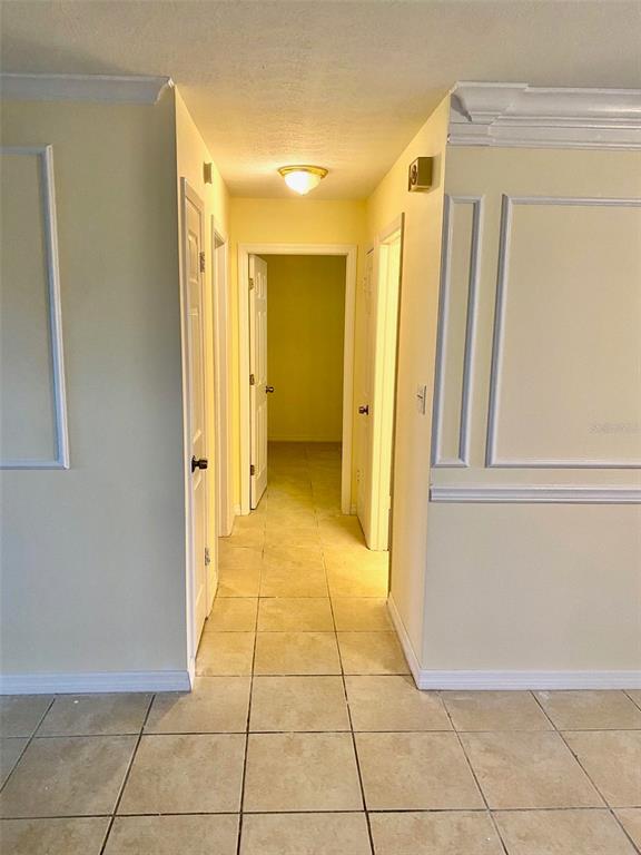 3906 Headsail Drive New Port Richey, FL 34652 - Photo 10 of 21 a view of a hallway to rooms