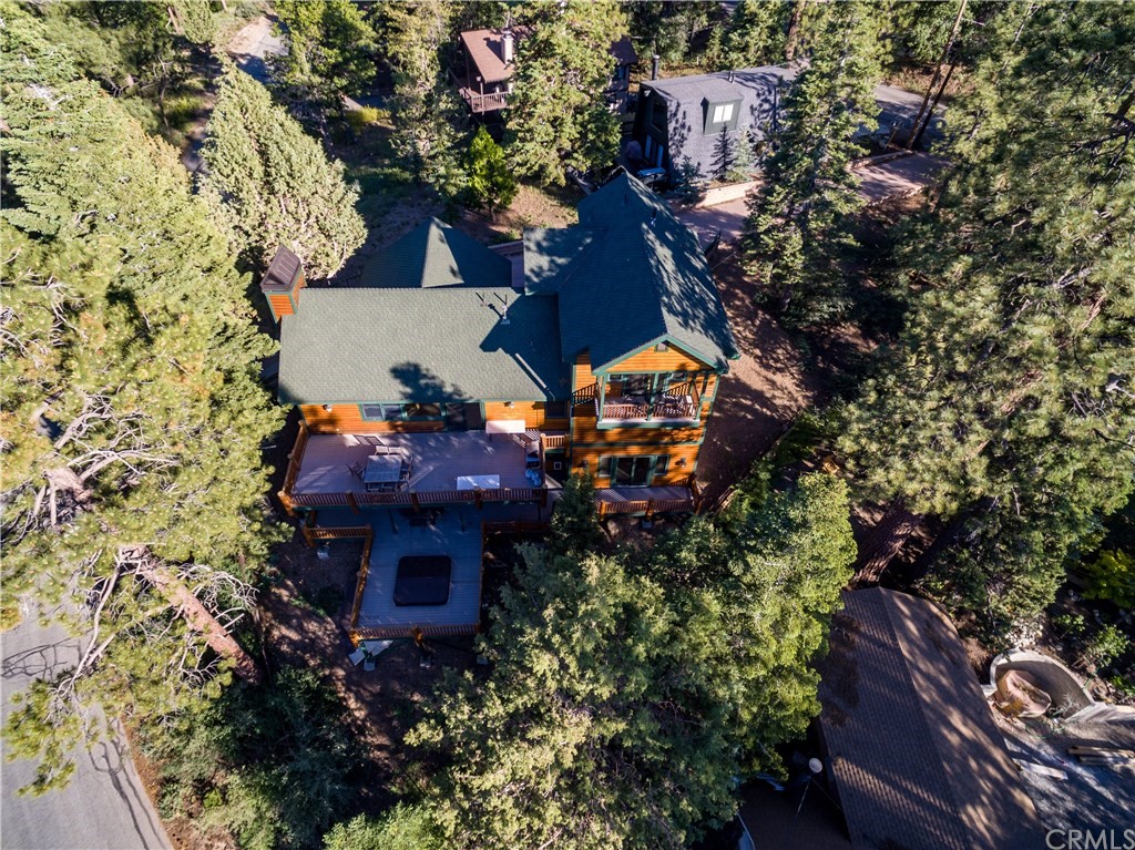 43490 Primrose Drive Big Bear Lake, CA 92315 - Photo 4 of 69 an aerial view of a house with a yard and garden