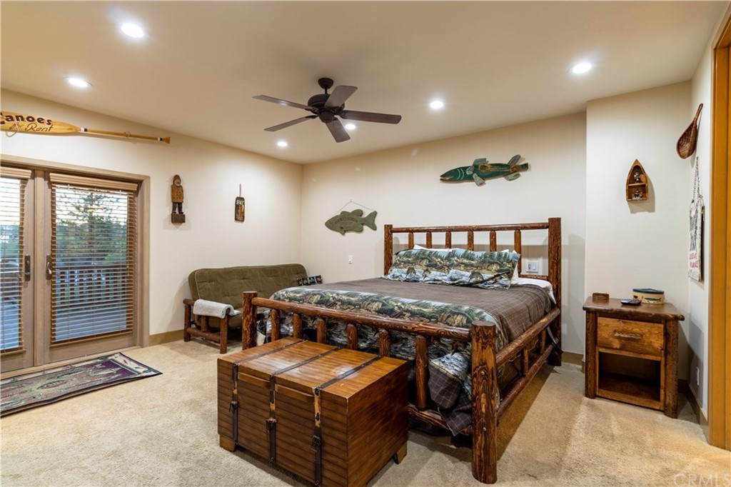 43490 Primrose Drive Big Bear Lake, CA 92315 - Photo 44 of 69 a bedroom with a bed next to a window