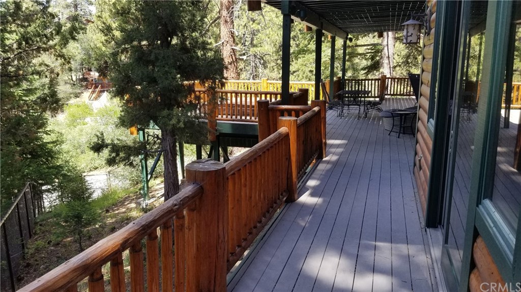 43490 Primrose Drive Big Bear Lake, CA 92315 - Photo 56 of 69 a view of balcony with wooden floor and fence