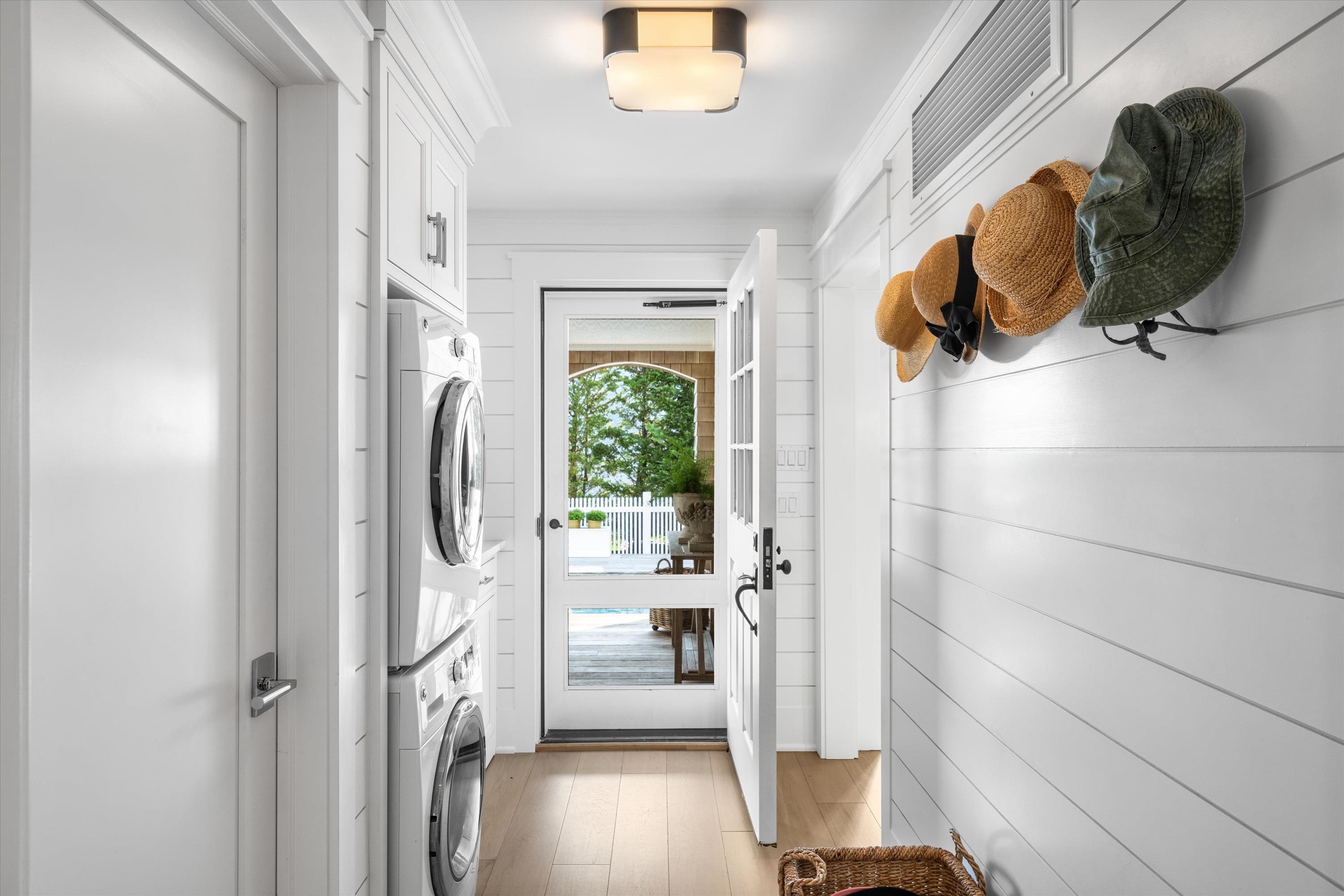 74 38th Street Avalon, NJ 08202 - Photo 11 of 50 a bathroom with a sink and a mirror