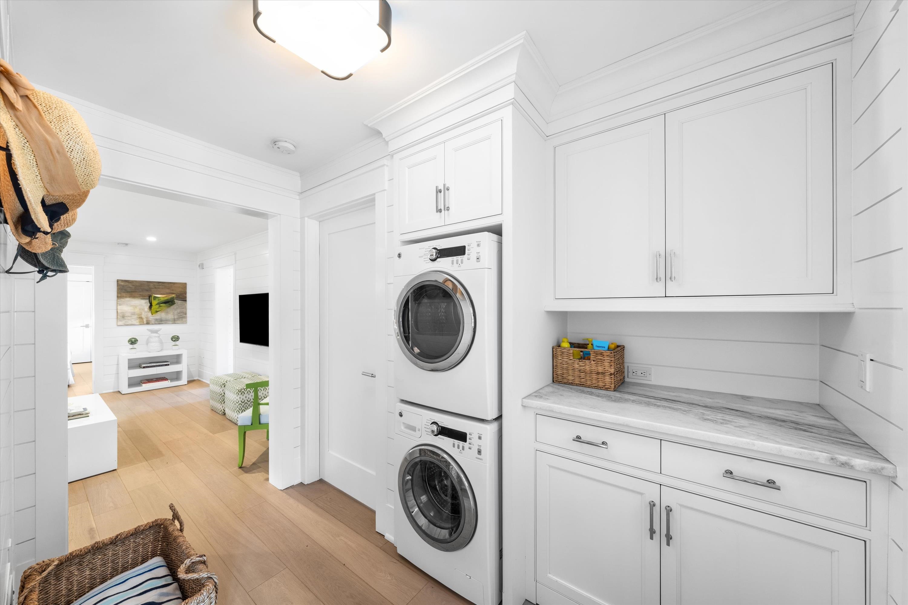 74 38th Street Avalon, NJ 08202 - Photo 12 of 50 a view of a kitchen with washer and dryer