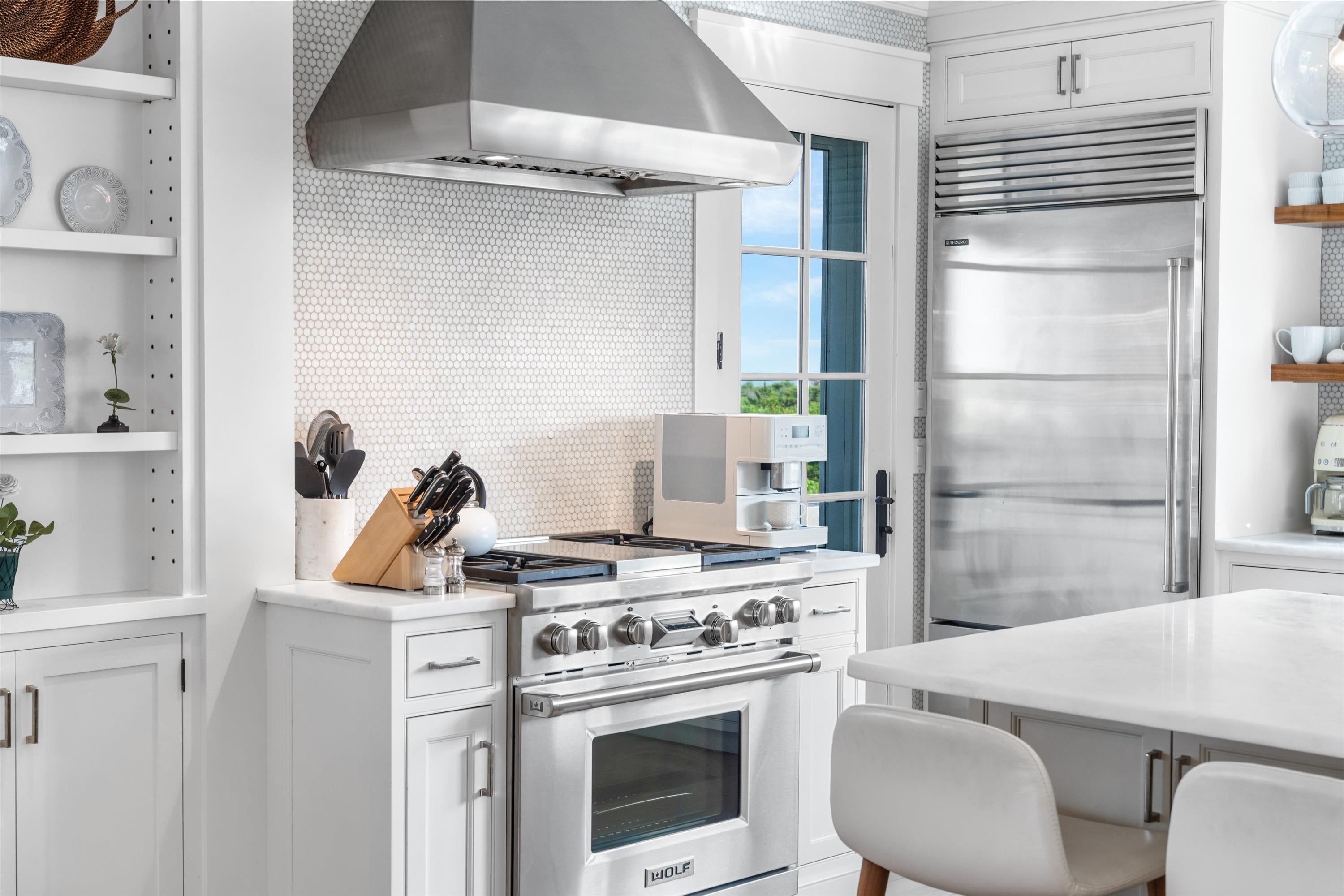 74 38th Street Avalon, NJ 08202 - Photo 23 of 50 a kitchen with a stove and a refrigerator