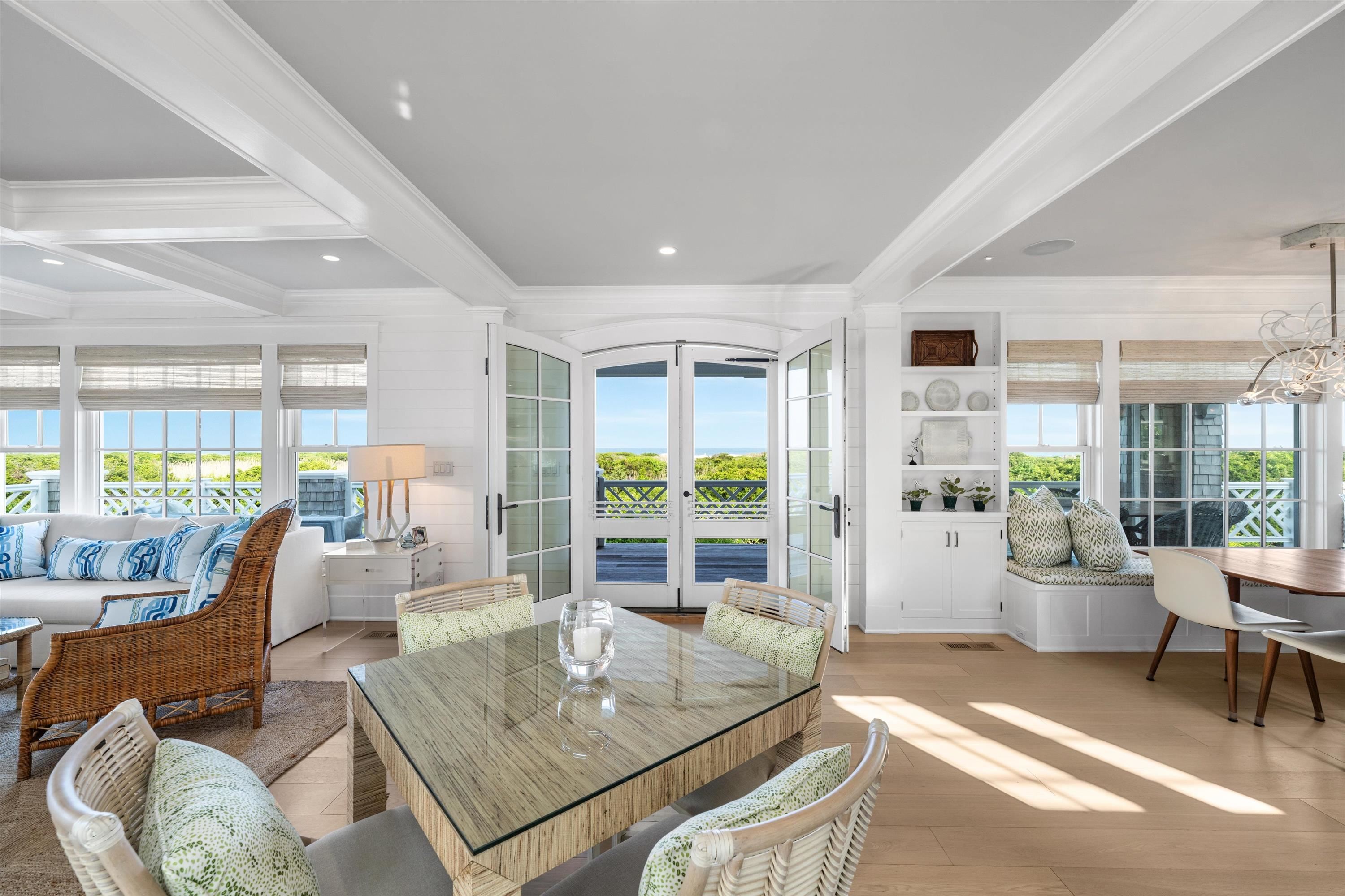 74 38th Street Avalon, NJ 08202 - Photo 27 of 50 a living room with furniture and a large window