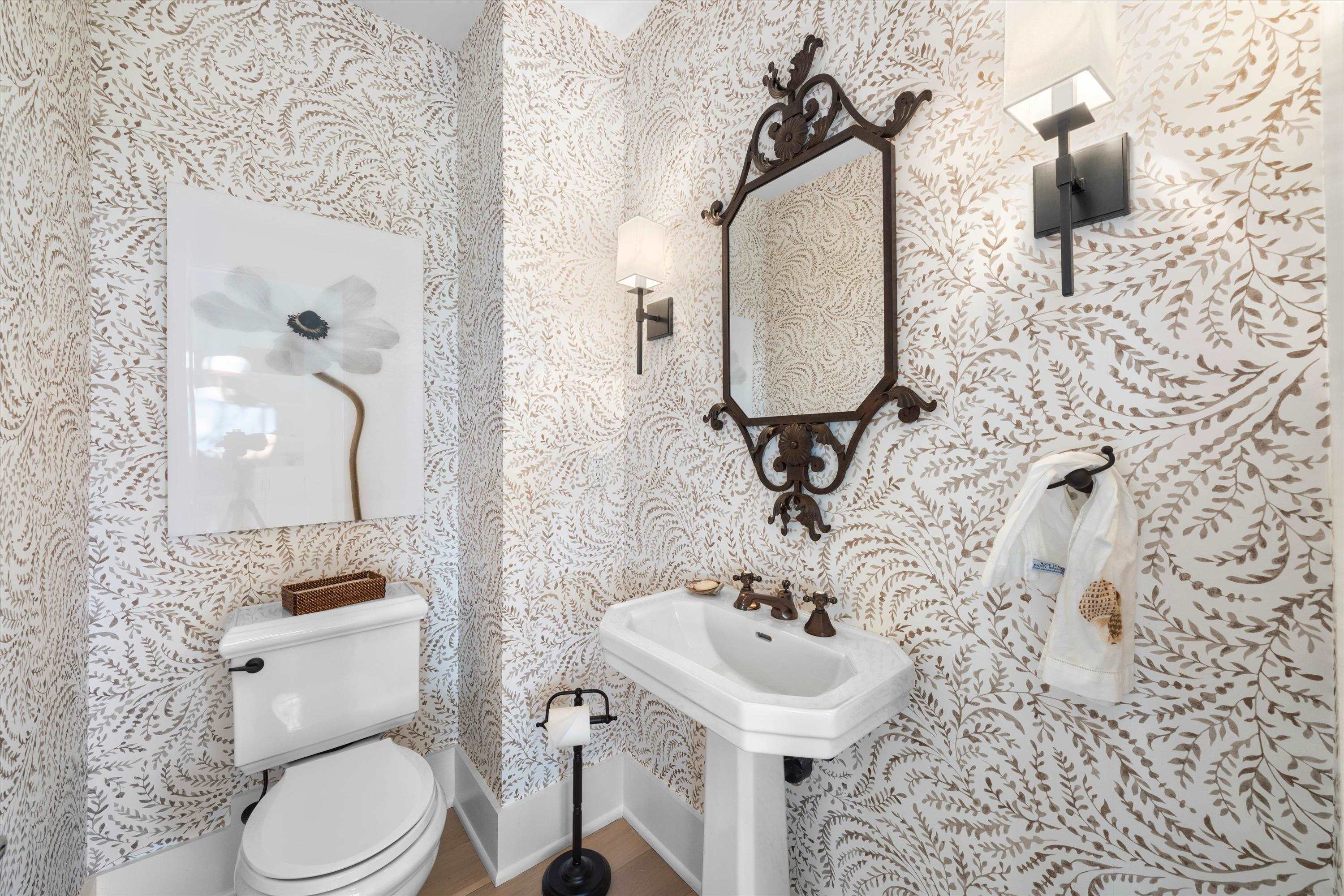 74 38th Street Avalon, NJ 08202 - Photo 32 of 50 a bathroom with a sink toilet and mirror