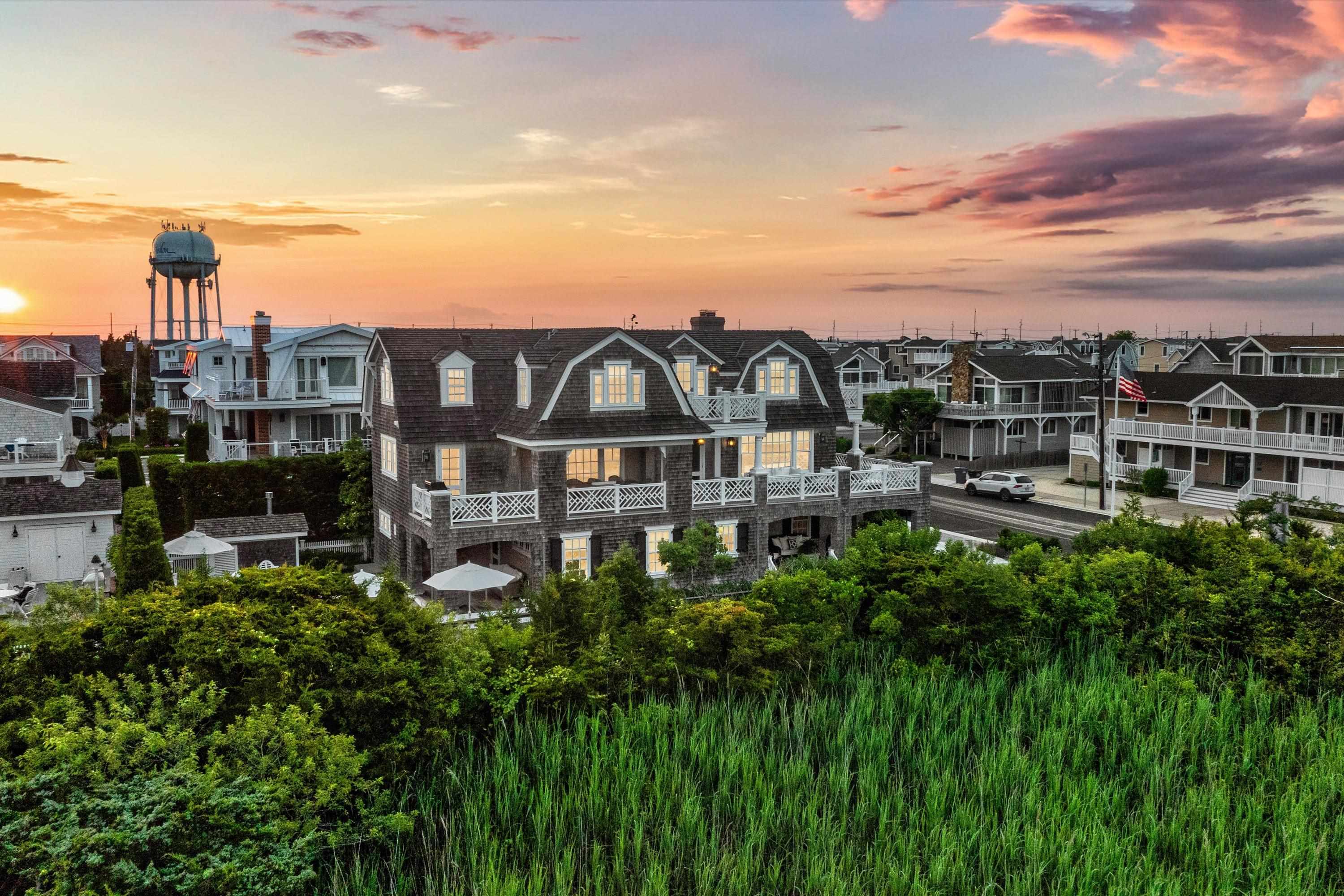 74 38th Street Avalon, NJ 08202 - Photo 48 of 50 a view of a lake with a building in front of it