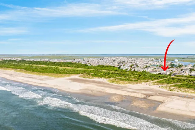 a view of a lake with a beach