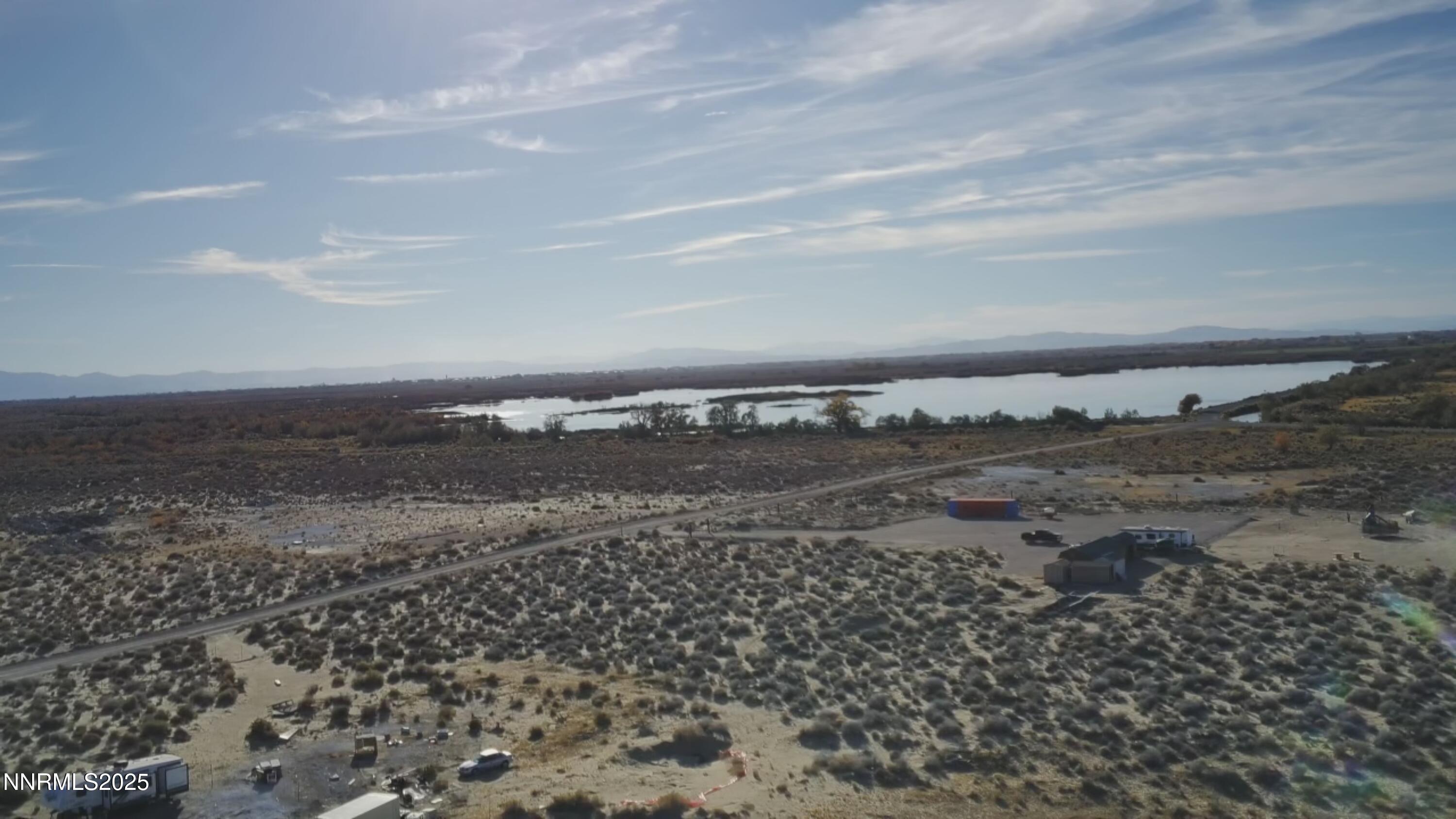 8409 Stuart Road Fallon, NV 89406 - Photo 9 of 12 a view of a dry yard with wooden floor