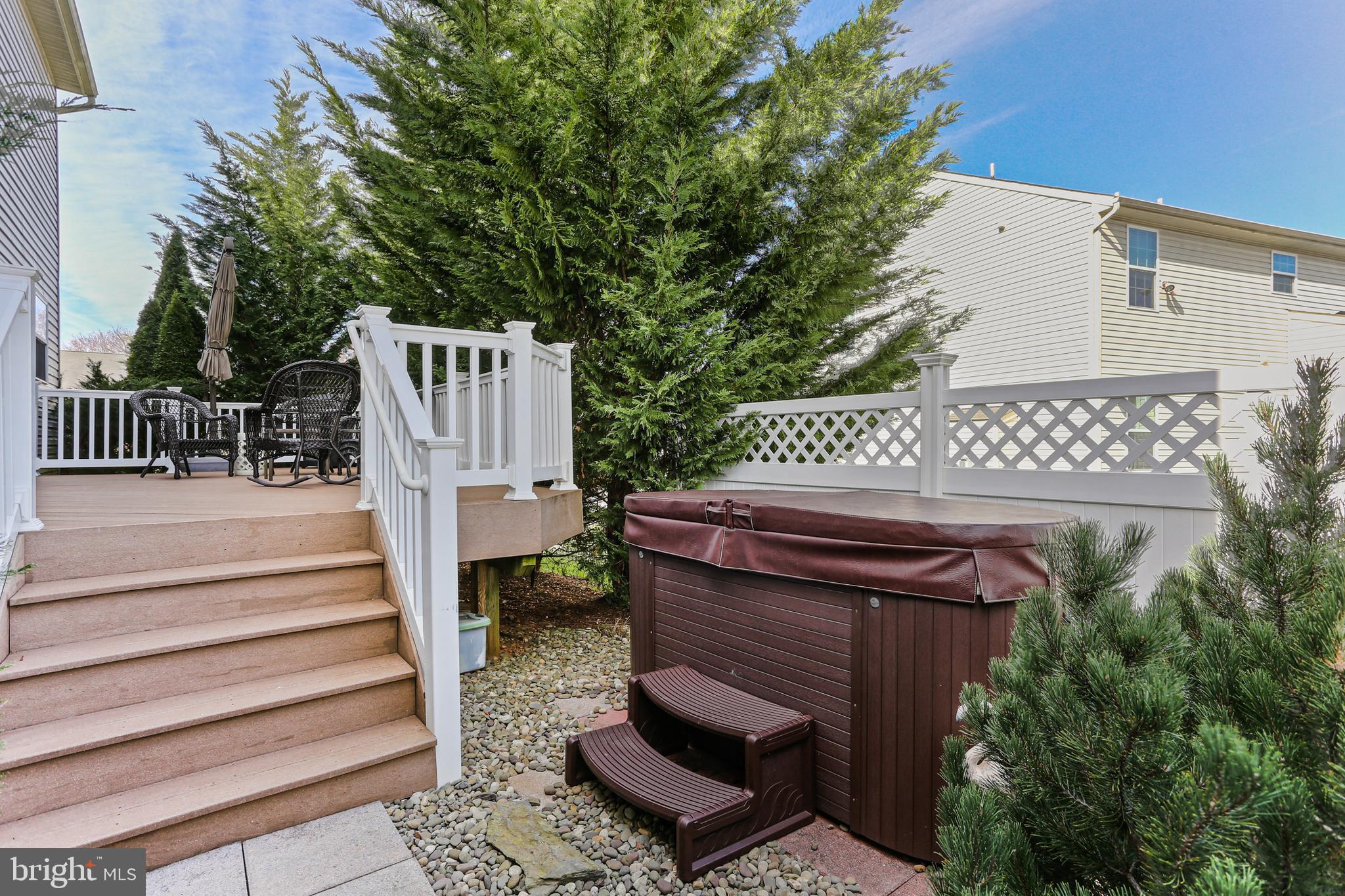 1122 Sassafras Circle Eldersburg, MD 21784 - Photo 39 of 40 Hot tub surrounded by mature landscaping