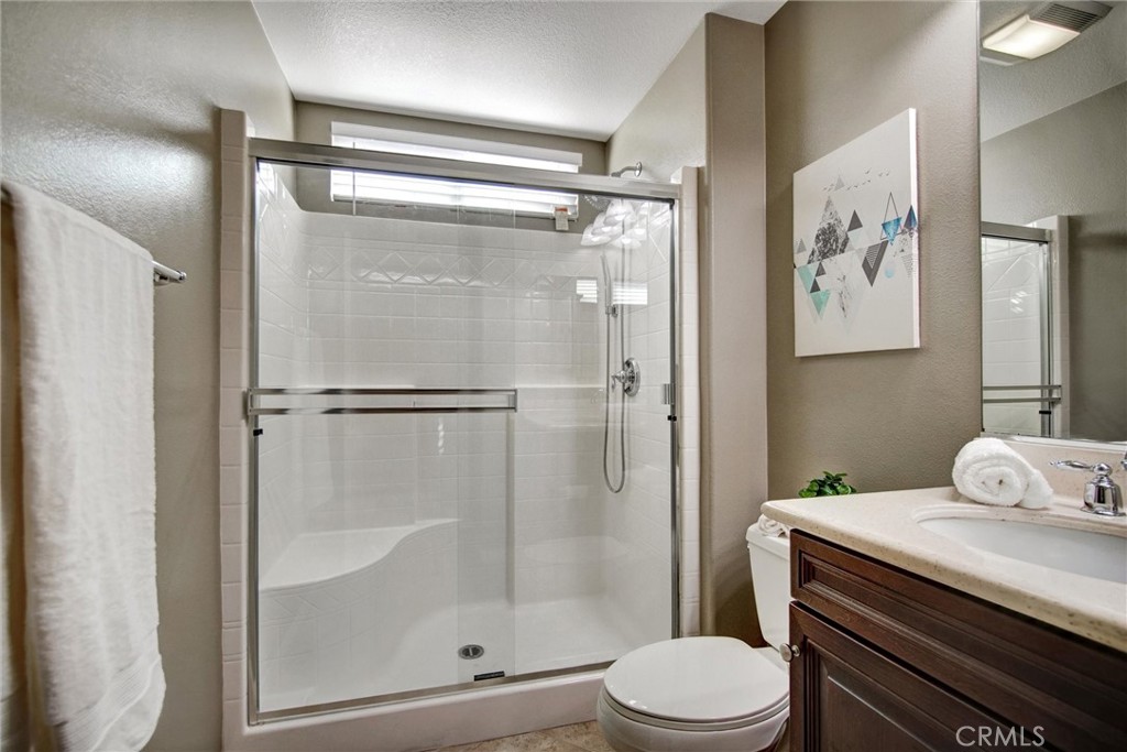 7863 Whippet Street Eastvale, CA 92880 - Photo 14 of 65 Downstairs full bathroom