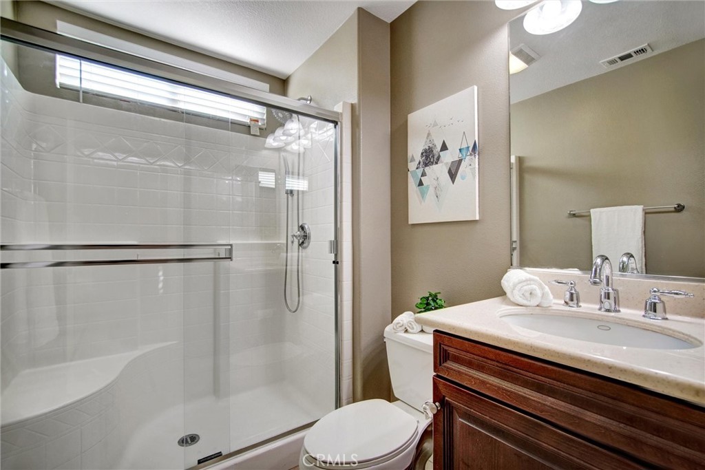 7863 Whippet Street Eastvale, CA 92880 - Photo 15 of 65 Downstairs full bathroom