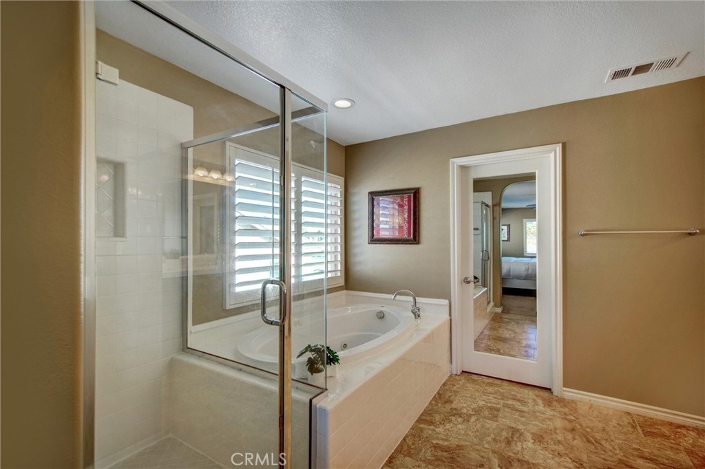 7863 Whippet Street Eastvale, CA 92880 - Photo 37 of 65 Primary En-Suite