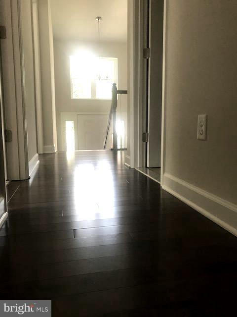 439 West Maple Road Linthicum Heights, MD 21090 - Photo 16 of 30 a view of a hallway with wooden floor