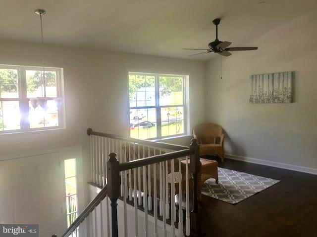 439 West Maple Road Linthicum Heights, MD 21090 - Photo 7 of 30 a view of a livingroom with wooden floor and a window