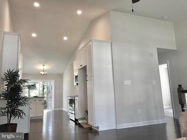 439 West Maple Road Linthicum Heights, MD 21090 - Photo 9 of 30 a view of a big room with wooden floor and windows