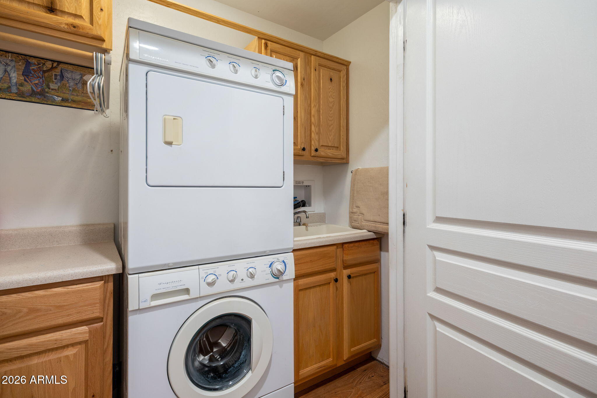 2236 Cross Country Road Overgaard, AZ 85933 - Photo 16 of 59 a utility room with dryer and washer