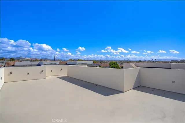 a living room with furniture a window and a ceiling fan