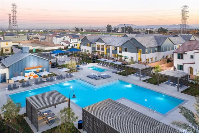 a view of swimming pool with outdoor seating