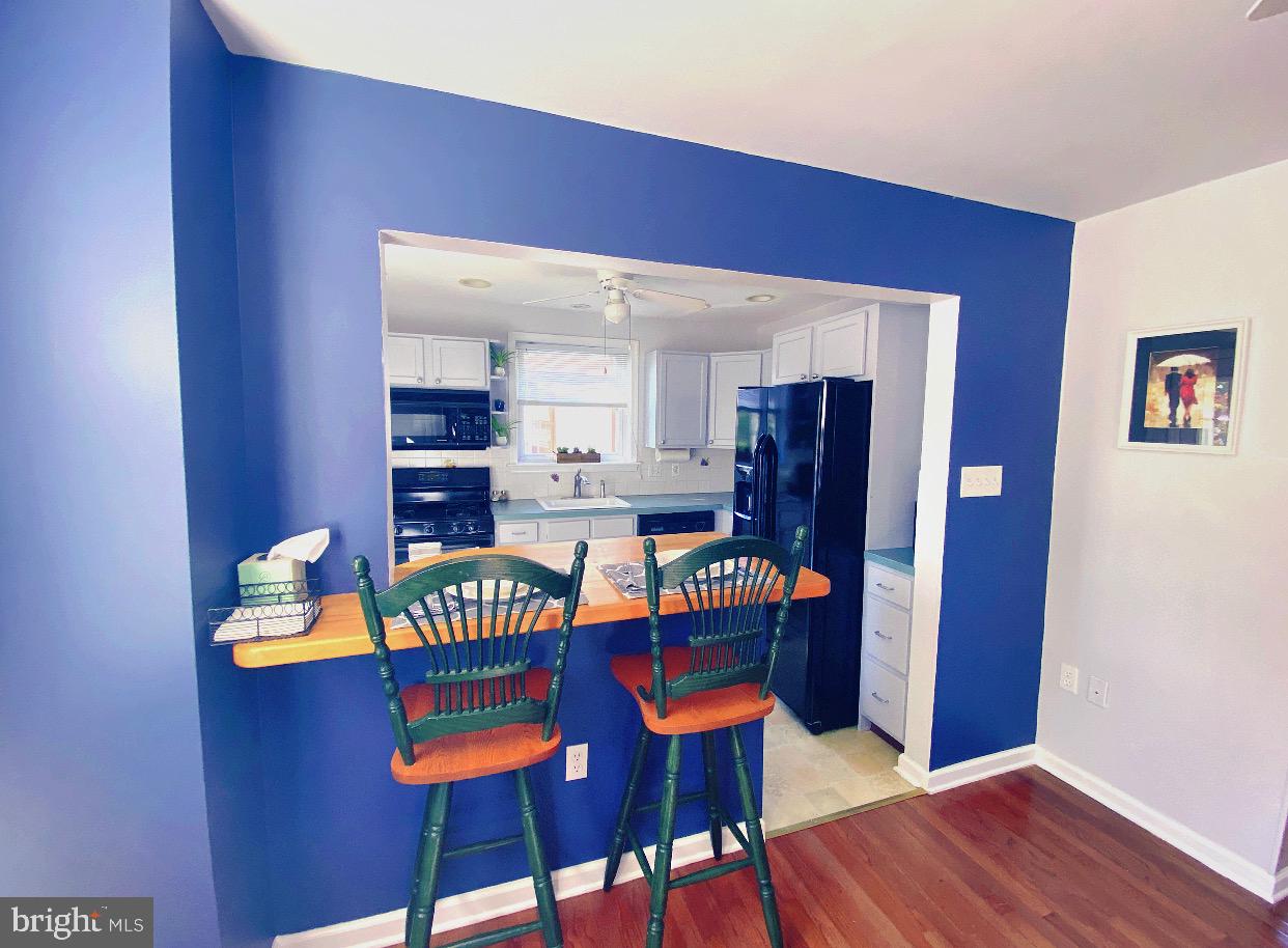 109 Barren Road Newtown Square, PA 19073 - Photo 13 of 52 Dining Room opens to kitchen with breakfast bar