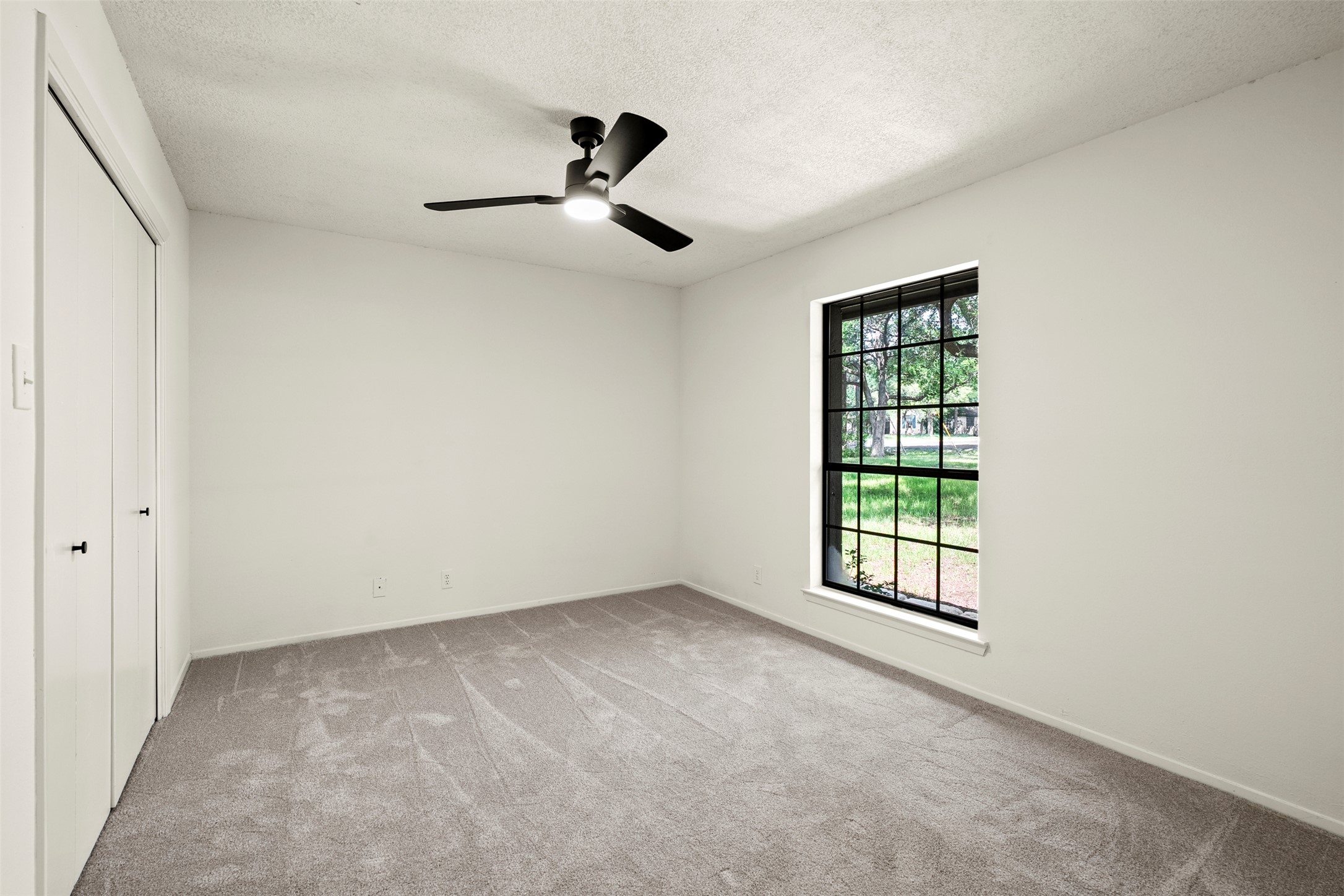 303 West Sequoia Spur Georgetown, TX 78628 - Photo 19 of 34 a view of an empty room with a window