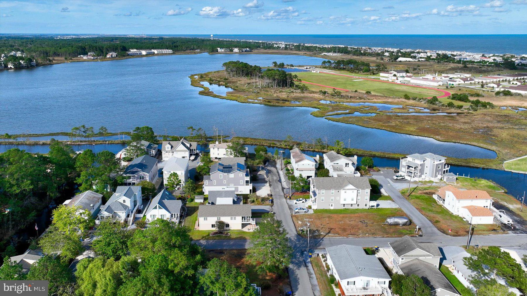 679 Evans Avenue Bethany Beach, DE 19930 - Photo 1 of 12 an aerial view of residential houses with outdoor space