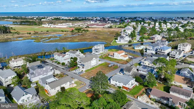 an aerial view of a city and lake view