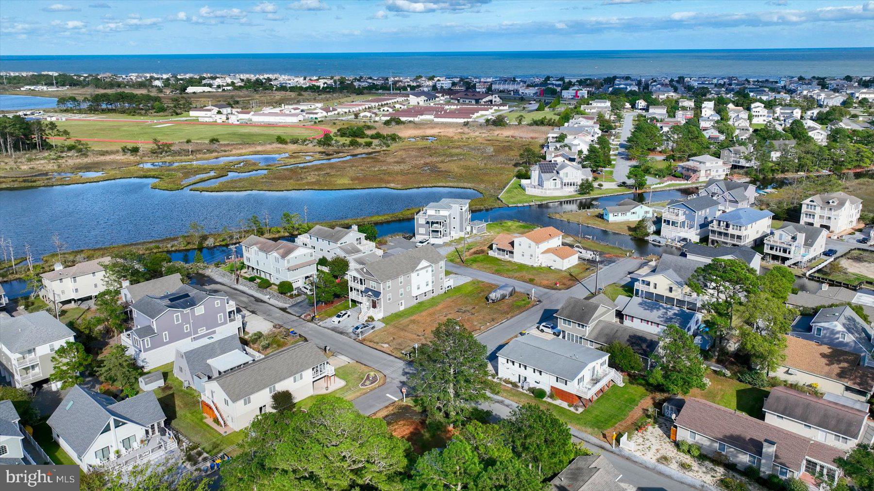 679 Evans Avenue Bethany Beach, DE 19930 - Photo 12 of 12 an aerial view of a city and lake view